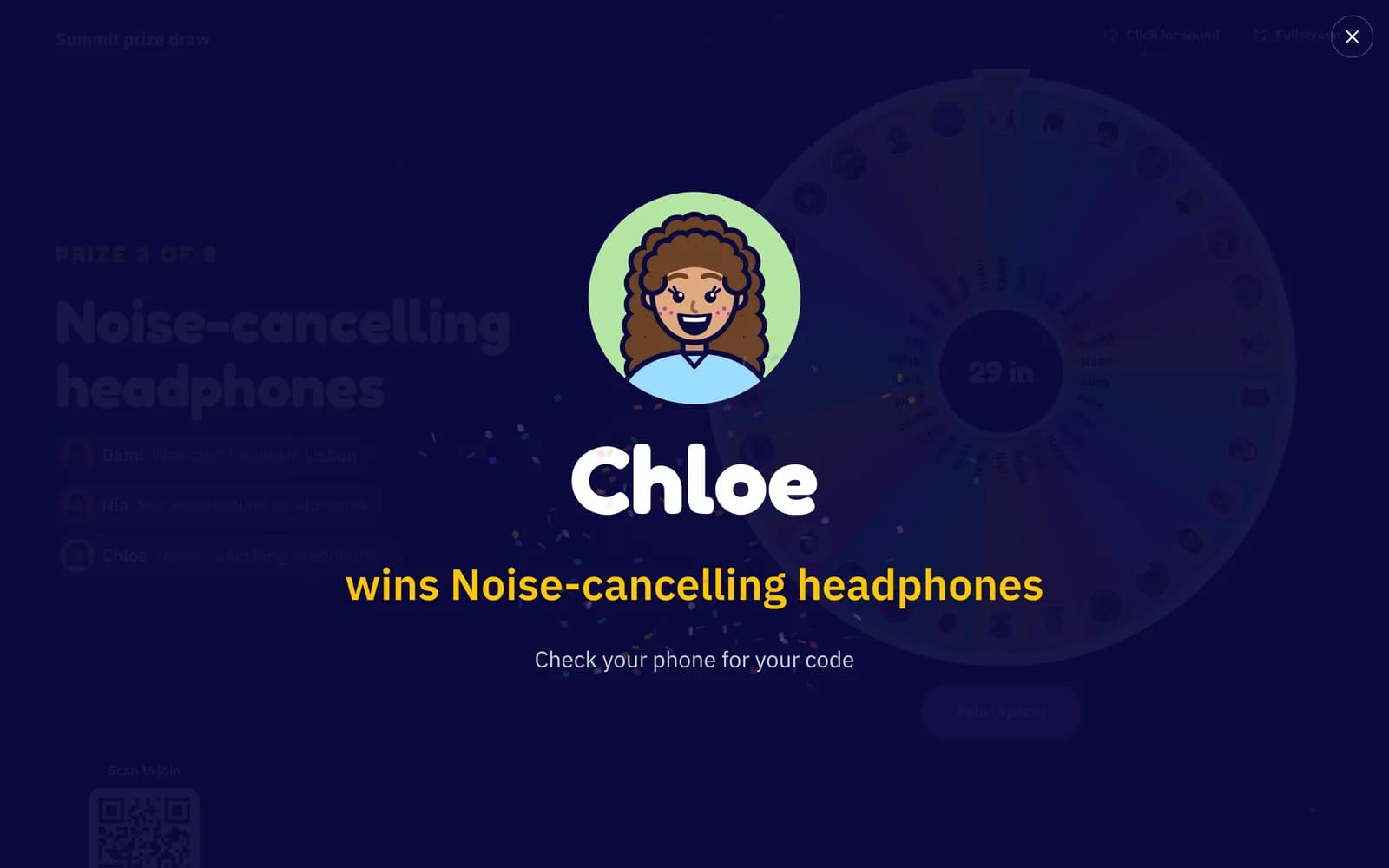 A winner reveal on the big screen: Chloe's avatar with confetti and the line Chloe wins Noise-cancelling headphones